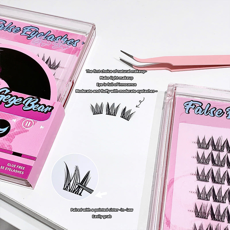 False eyelashes packaging with pink and black design on a white background