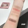 Makeup swatches on a person's arm with a palette in the background