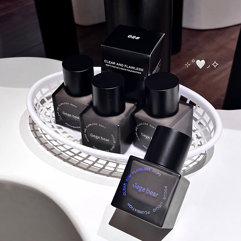Gege bear nail polish bottles and boxes on a white surface with a blurred background