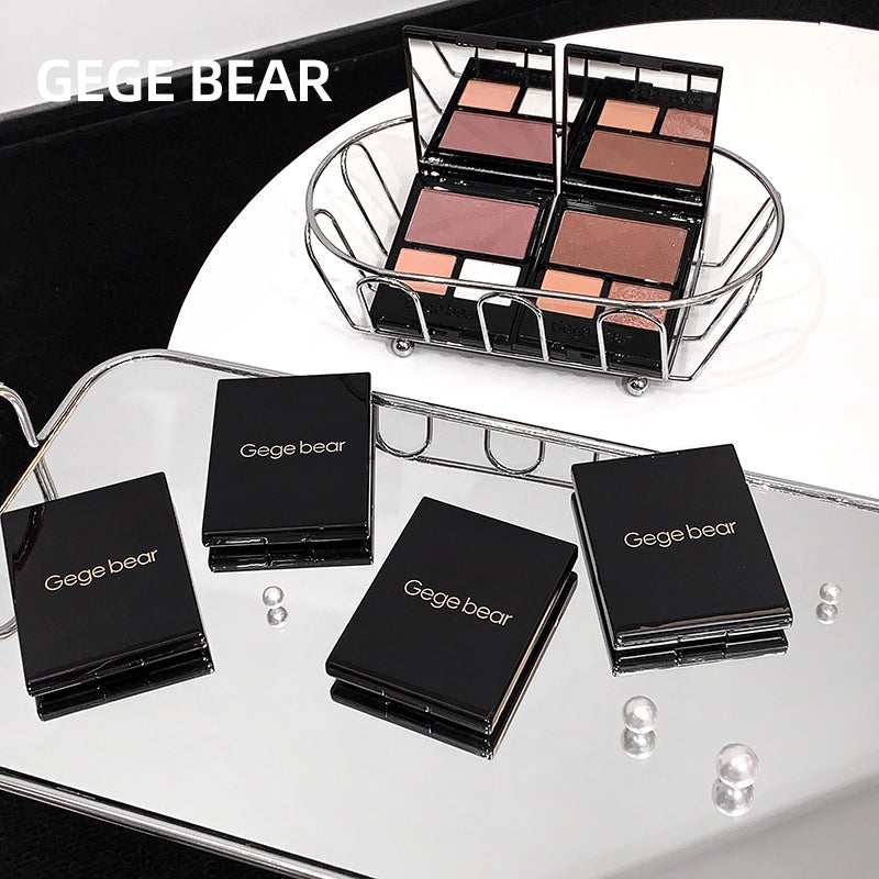 Makeup products with 'GEGE BEAR' branding on a reflective surface.