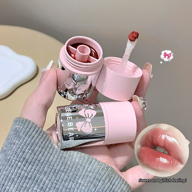 Pink lip balm with a small mirror held by a hand, with a close-up of lips and brand name 'Geege Bear' visible.
