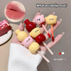 Cute lip mud products with cartoon bear faces on a hand, labeled 'What a cute lip mud!'.
