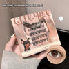 False eyelashes packaging with a hand holding it and an inset of an eye wearing the lashes.