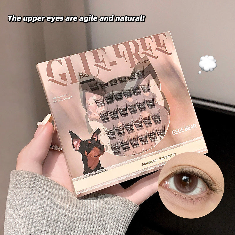 False eyelashes packaging with a hand holding it and an inset of an eye wearing the lashes.