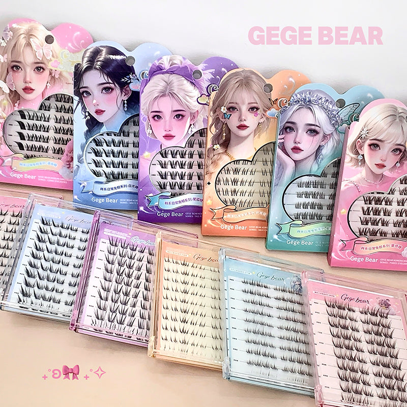 Collection of false eyelash packages with colorful packaging featuring cartoon characters, branded 'GEGE BEAR'.