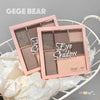 Gege Bear eye shadow palette on a decorative surface with a gray background
