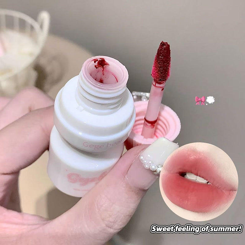 Lip gloss with applicator and close-up of lips, text 'Sweet feeling of summer!'