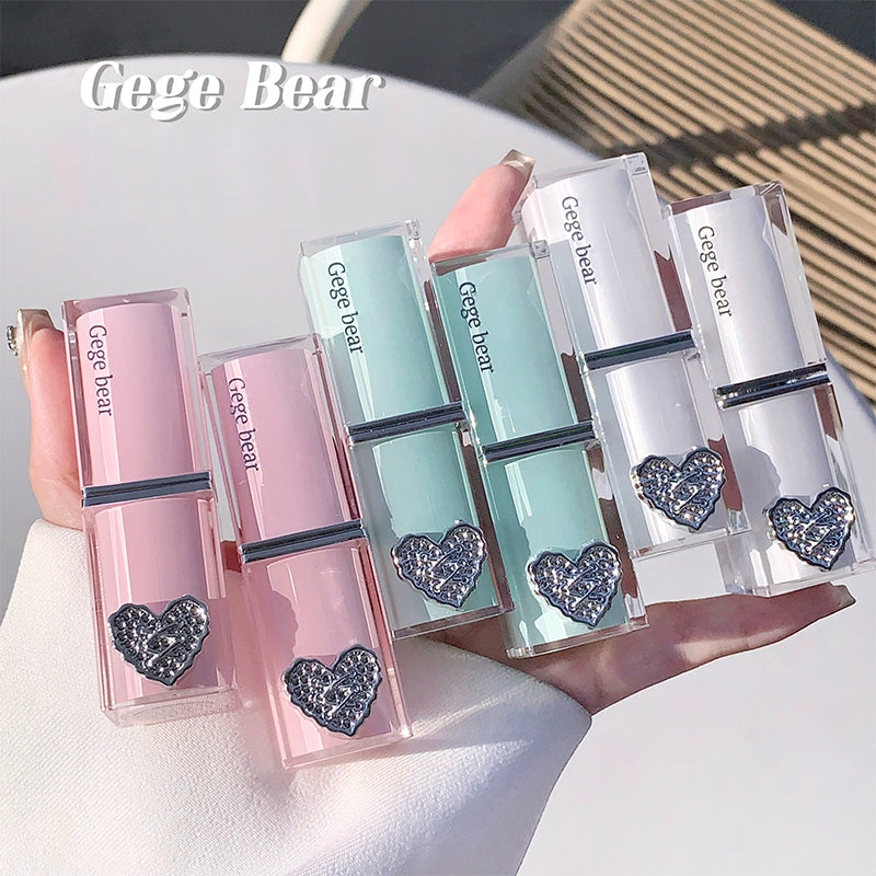 Set of Gege Bear lip glosses with heart-shaped designs on a white surface.