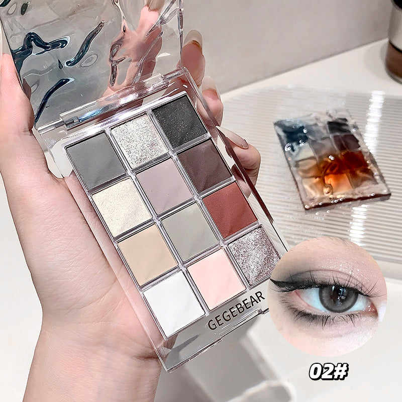 Makeup palette with GEGBEAR branding held by a hand, with an eye close-up on a white background.
