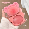 Pink bear-shaped makeup case with blush held by a hand