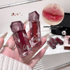 Two lip glosses held in a hand with a close-up of lips wearing the gloss and text 'Applying lip gloss makes you look fairer!'.