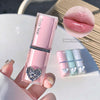 Pink lipstick with heart detail held by a hand, close-up of lips wearing the lipstick, and nail polish swatch.