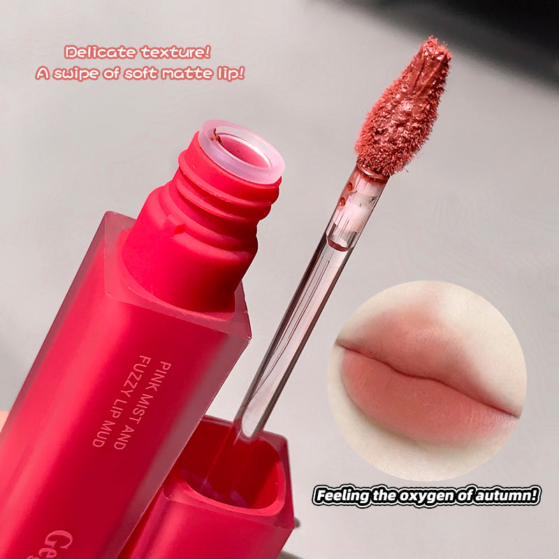 Red fuzzy lip product with applicator and close-up of lips, text on texture and autumn feeling.