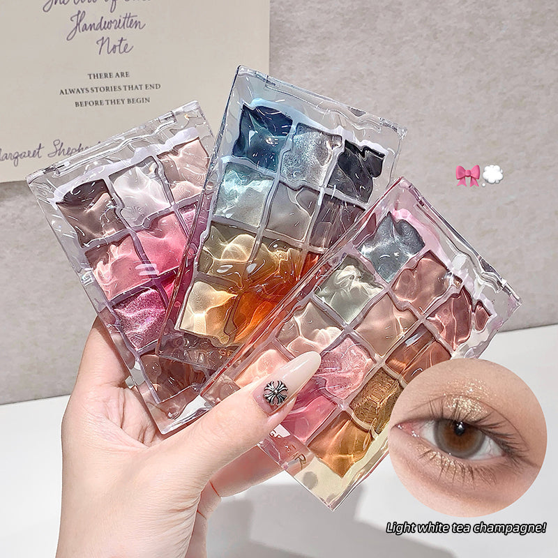 Makeup palette with water ripple patterns held by a hand, close-up of eye wearing the product.