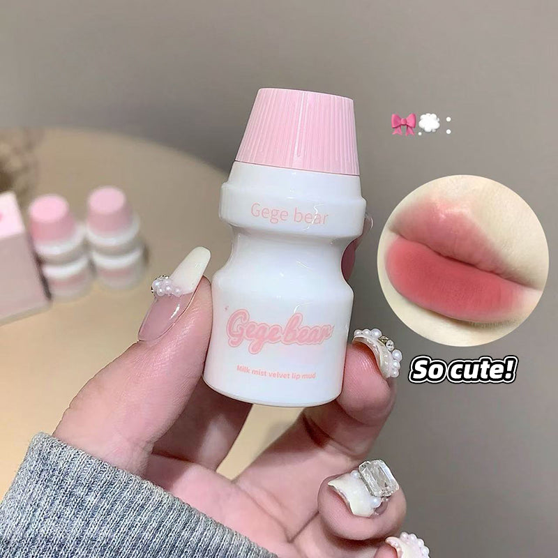 Small white bottle with pink cap held by a hand, with close-up of lips and 'So cute!' text.