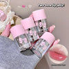 Four two-tone lip jelly products with pink and silver packaging held by a person, with an inset of a lip swatch.