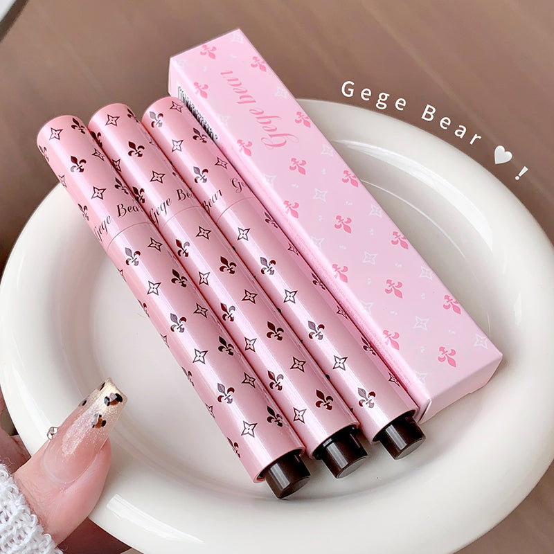 Set of pink lip glosses with decorative patterns on a white plate, branded 'Gege Bear'.