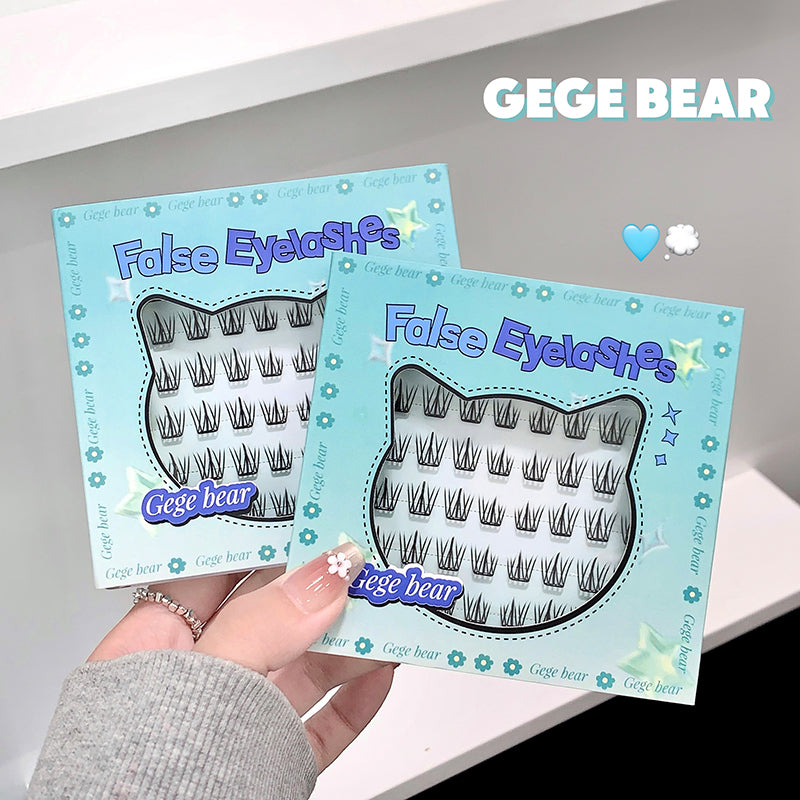 False eyelashes packaging with 'GEGE BEAR' branding held by a hand.