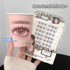 False eyelashes packaging with a model wearing them, on a gray background.
