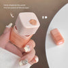 Hand holding a cosmetic product with text about dispensing paste and dosage control.