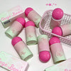 Pink and green cosmetic products with 'Gege Bear' branding on a light background