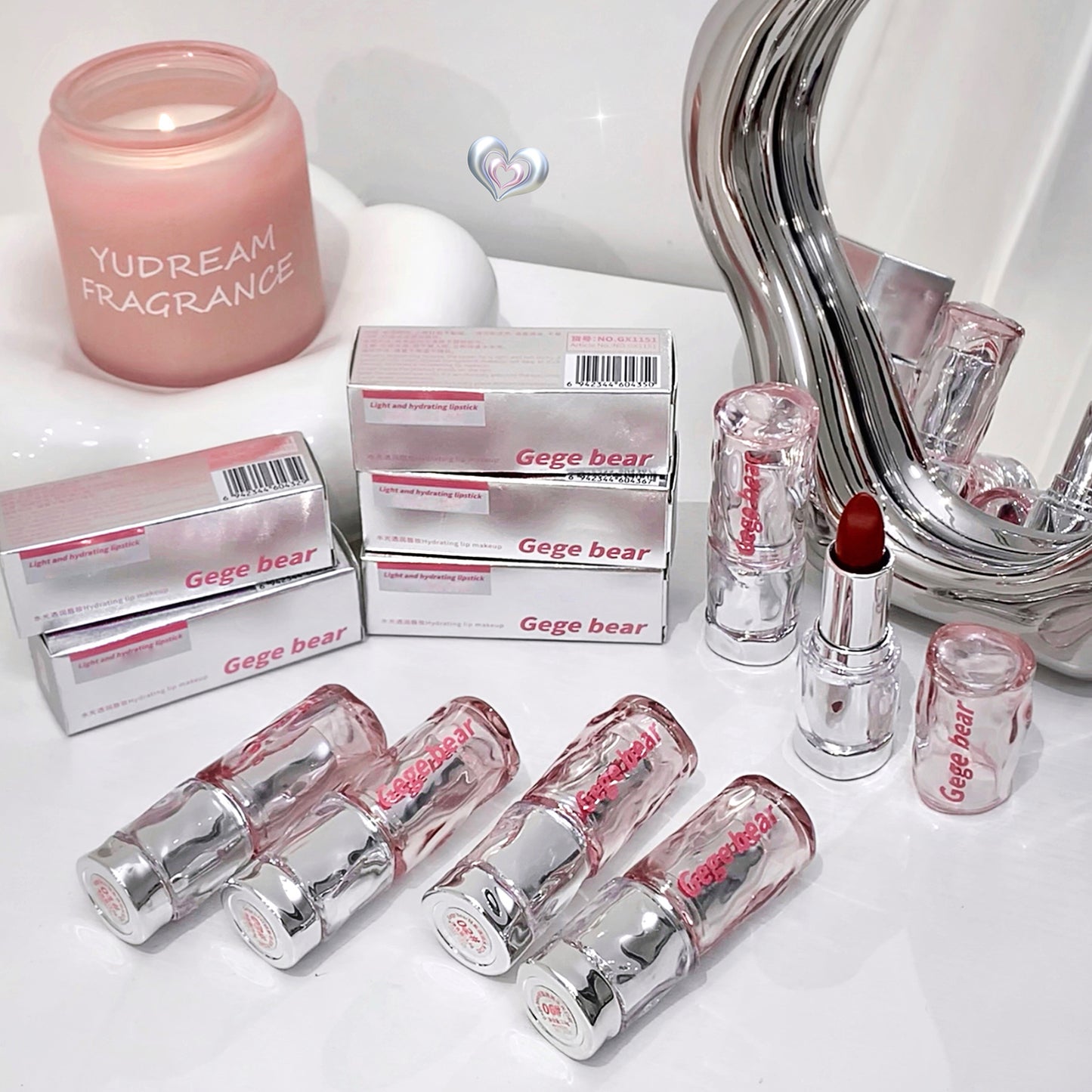 Makeup products including lipsticks and lip glosses with 'Gege bear' branding on a white surface.