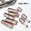 Set of lip glosses with visible brand 'Gege Bear' on a white background