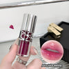 Lipstick held by a hand with a close-up of lips wearing the lipstick, and text 'Juicy juice feeling!' on a blurred background.