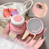 Pink makeup sponge and compact with 'Gege bear' branding, held by a hand.
