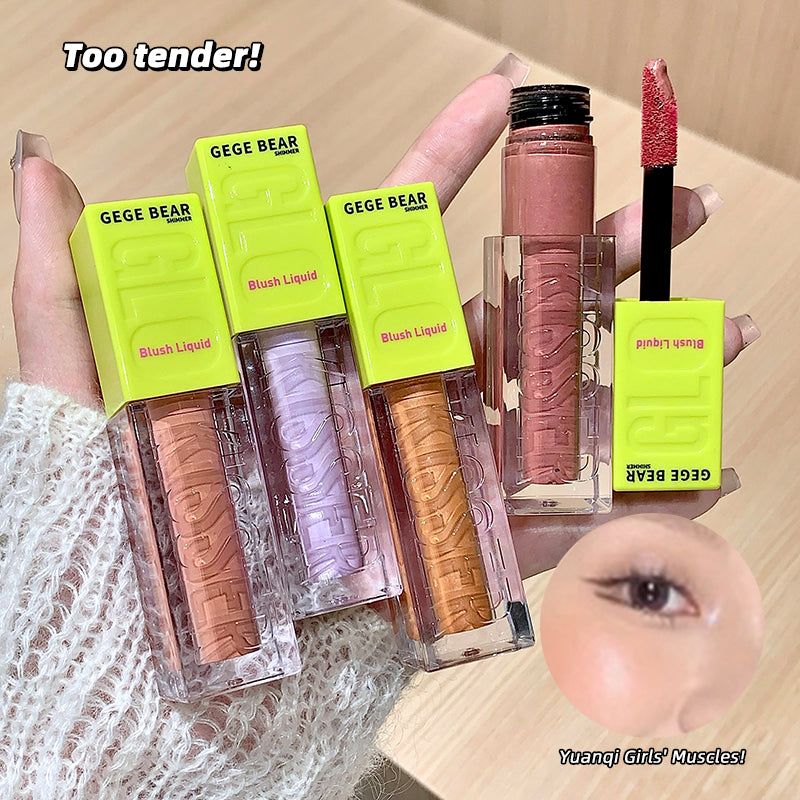 Three GEGE BEAR blush liquids with packaging held by a hand, one with an open cap showing the blush color.