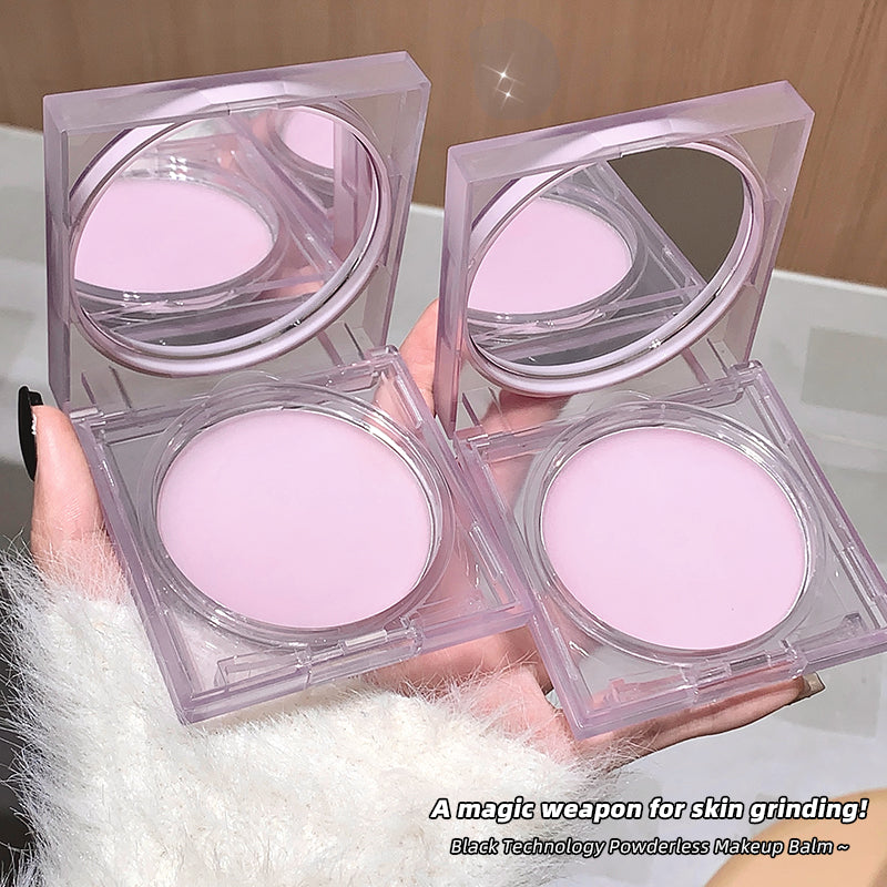 Four pink makeup balms in clear cases held by a person, with a blurred background.