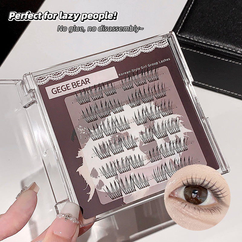 Eyelash packaging with false eyelashes and an inset of an eye wearing the lashes.