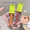 Two GEHE BEAR blush liquids held in a hand with a blurred face in the background.