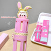 Pink pen with bunny design on a gray background