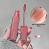 Lip gloss with applicator and close-up of color on a gray background