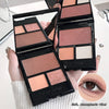 Makeup palettes with eyeshadows and a compact mirror, held by a hand.