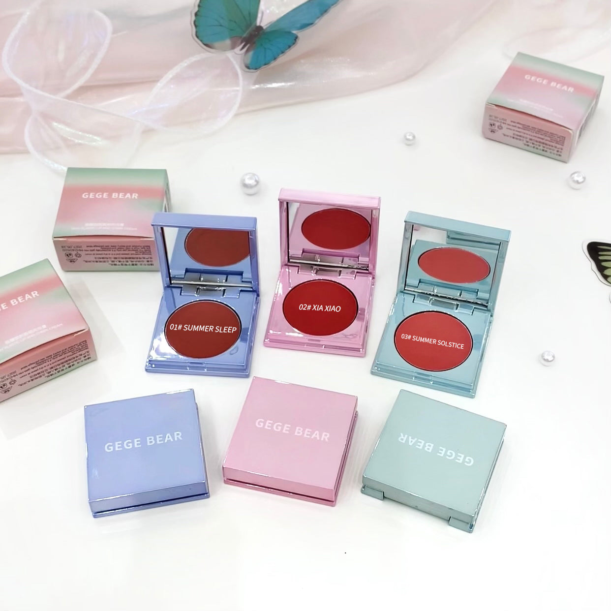 Compact blushes with open cases and closed boxes on a white background, featuring the brand 'GEGE BEAR'.