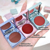 Three open blush compactes with different colors held in a hand.