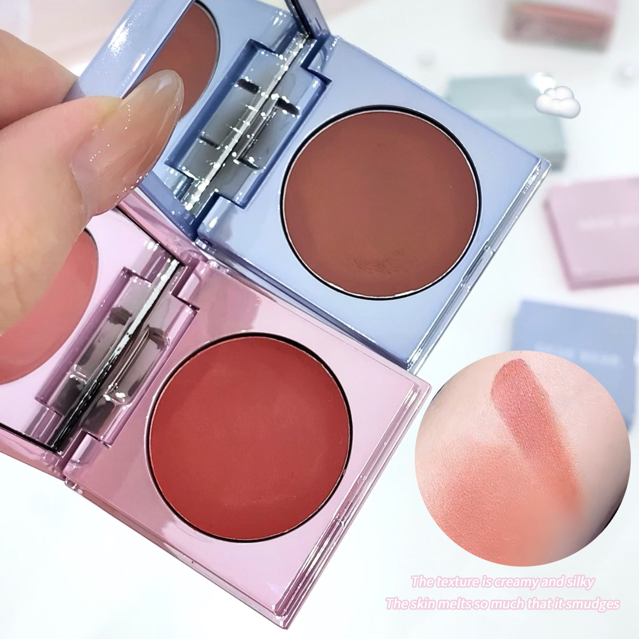 Makeup compact with blushes and a swatch on skin