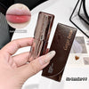 Lipstick and case held by a hand with close-up of lipstick color on lips.