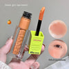 Lip gloss with applicator and packaging held by a hand, with close-up shots of the product and application on skin.