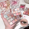 Makeup palette with colorful eyeshadows held by a hand, with an inset of an eye wearing the makeup.