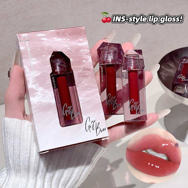 Go! Buu lip gloss set with packaging and close-up of lip color on a neutral background