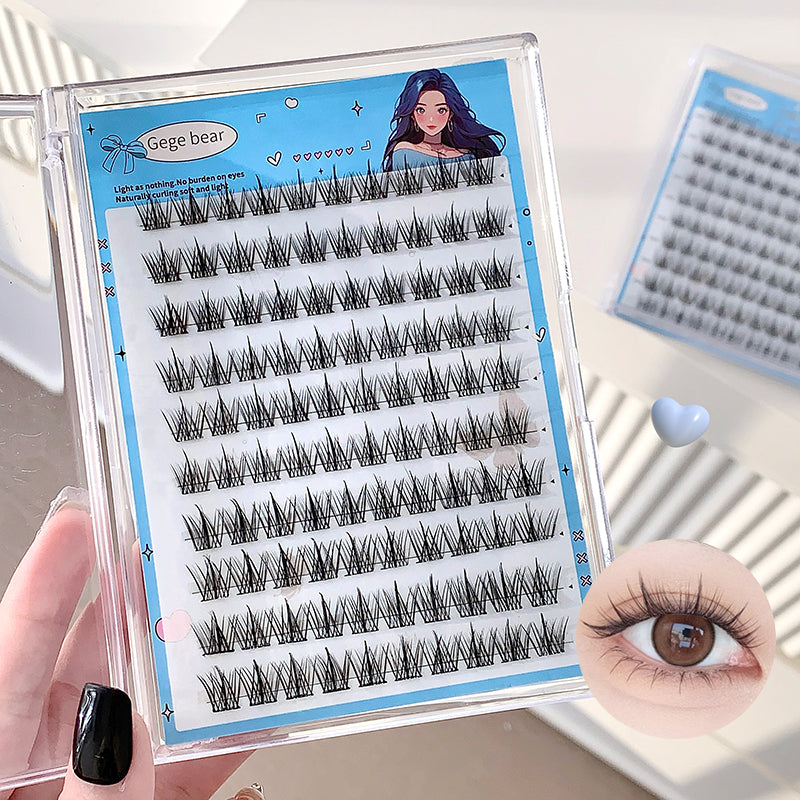 Eyelash packaging with a clear case, blue label, and close-up of an eye wearing the lashes.