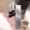 Two GEGE BEAR lip glosses with their packaging held by a hand.