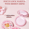 Two pink makeup compact cases with cartoon designs on a light pink background.