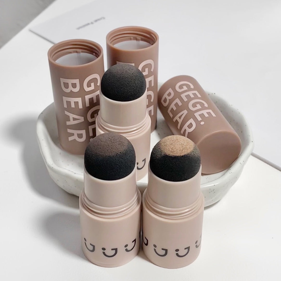 Makeup sticks with GEGE BEAR branding on a white background