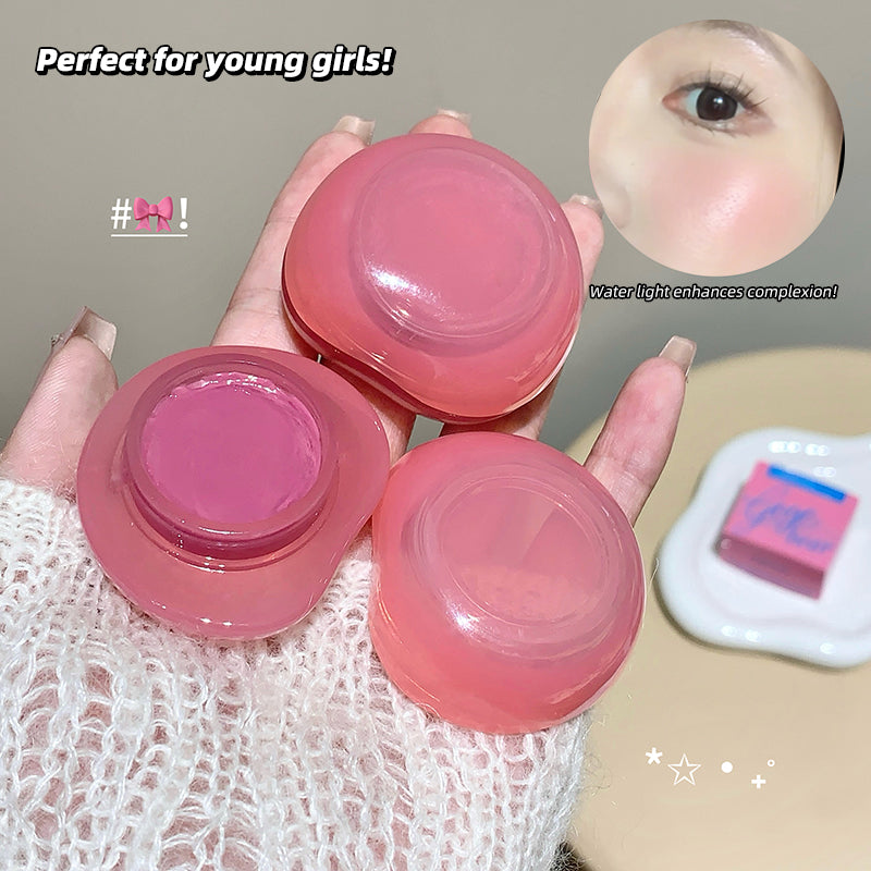 Three pink cosmetic containers held by a hand, with text and close-up of an eye.