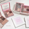 Makeup eyeshadow palettes with 'Gege Bear' branding on a white surface.