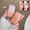 Two cosmetic products held by a hand with a before and after comparison of dark circles on a brown background.